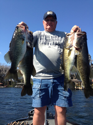 Guy with Big Florida Largemouth Bass from Kissimmee Chain of Lakes